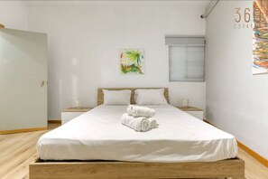 1 bedroom, desk, iron/ironing board, travel cot