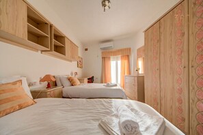 4 bedrooms, desk, iron/ironing board, travel cot