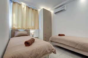 Desk, iron/ironing board, travel crib, WiFi