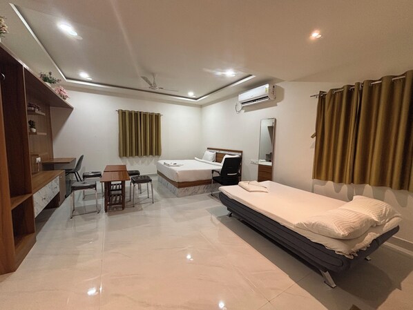 Habitación Deluxe doble, vistas a la ciudad | Zona de estar