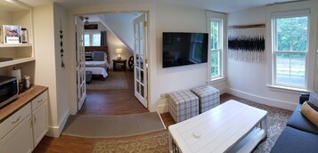 Suite, 1 King Bed | Living area | 36-inch Smart TV with digital channels