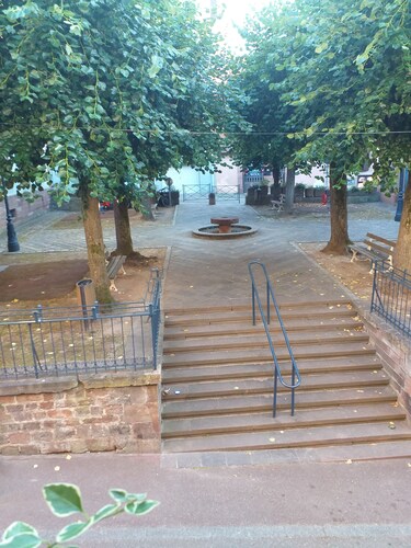 "Place Monet", a pretty, tree-lined square in the center of town.