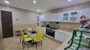 Economy House, Balcony, Sea View | Shared kitchen