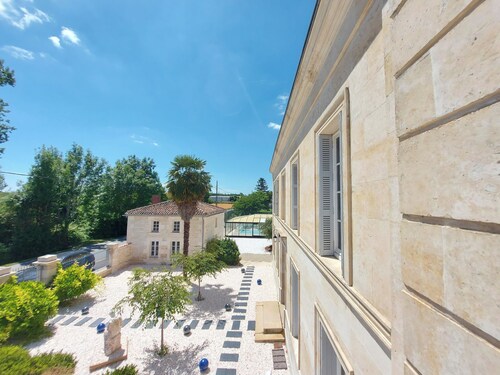 CHATEAU EMILE HAROCH AT THE FOOT OF THE VENISE VERTE