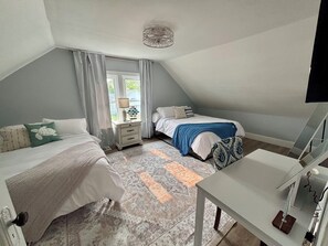 3 bedrooms, desk, iron/ironing board, travel cot