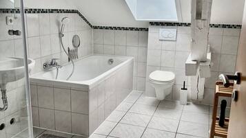 Hair dryer, towels, soap, toilet paper