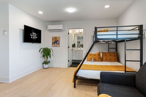 1 bedroom, desk, iron/ironing board, travel cot