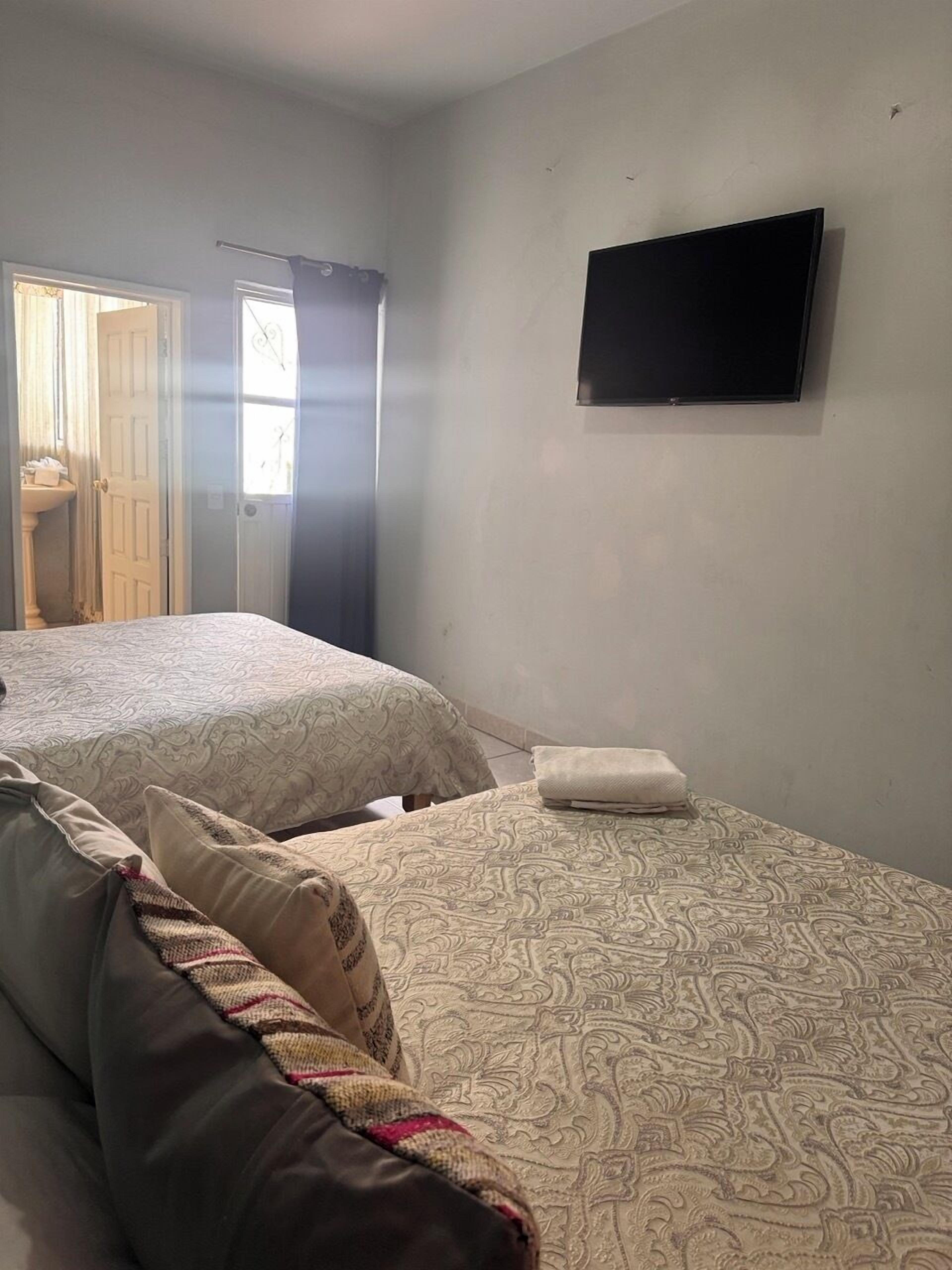 Standard fyrbäddsrum | Gratis wi-fi och sängkläder