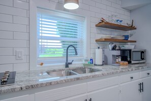 Microwave, stovetop, coffee/tea maker, blender