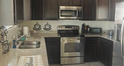Browny 4 bedrooms 2.5 bath home near freeway.
