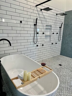 Shower, hair dryer, towels, toilet paper