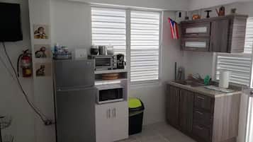 Fridge, microwave, stovetop, coffee/tea maker