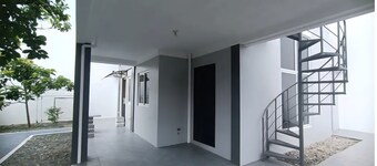  3-bedroom house with a garden, located in a safe, guarded village, with AC.