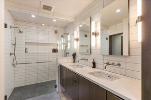 Shower, hair dryer, towels, soap