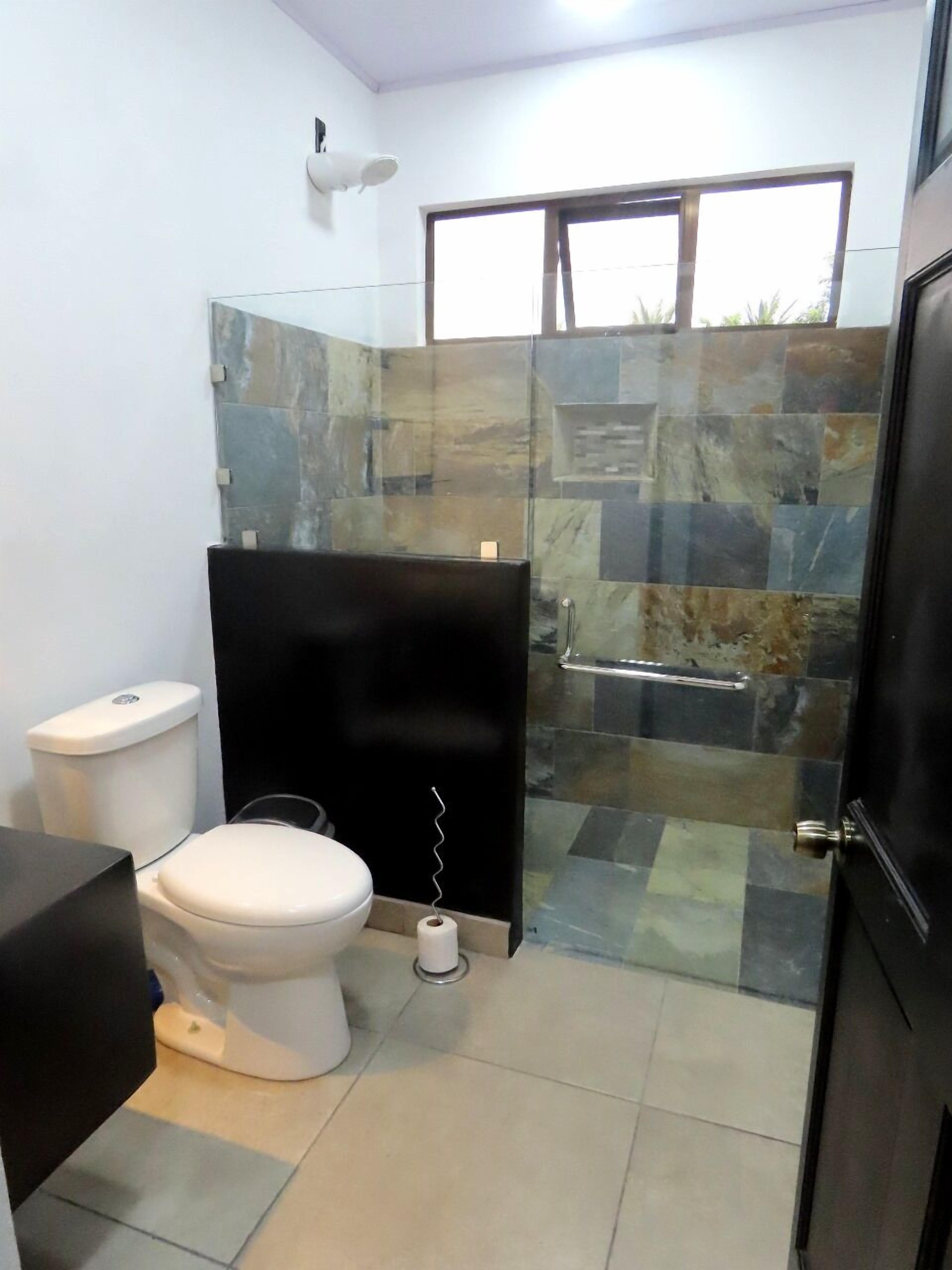 Superior Suite, Balcony, Garden View | Bathroom | Shower, towels, soap, shampoo