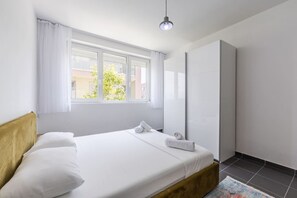 1 chambre, fer et planche à repasser, Wi-Fi gratuit, draps fournis