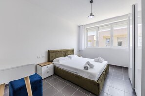 1 chambre, fer et planche à repasser, Wi-Fi gratuit, draps fournis