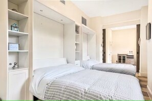 Desk, iron/ironing board, travel cot, free WiFi