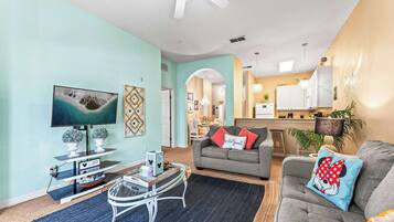 Condo, Multiple Beds, Balcony, Garden View (Mickey’s Postcard at Bahama Bay) | Living area | 42-inch flat-screen TV with digital channels