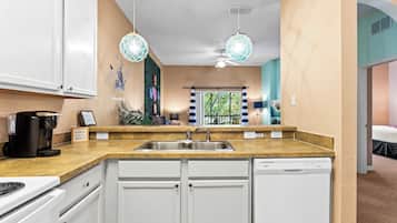 Condo, Multiple Beds, Balcony, Garden View (Mickey’s Postcard at Bahama Bay) | Private kitchen | Fridge, microwave, oven, stovetop