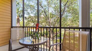 Condo, Multiple Beds, Balcony, Garden View (Mickey’s Postcard at Bahama Bay) | Outdoor dining