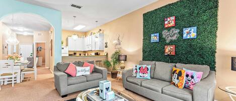 Condo, Multiple Beds, Balcony, Garden View (Mickey’s Postcard at Bahama Bay) | Living area