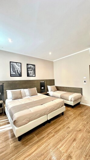 Standard Triple Room | In-room safe, desk, blackout drapes, soundproofing