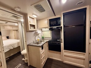 4 bedrooms, desk, iron/ironing board, travel cot