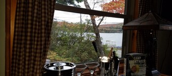 Historic Cabin Retreat - In Town and On the Lake! Minutes to Rail Trail