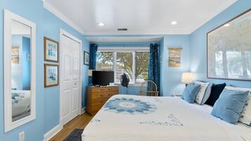 1 bedroom, desk, iron/ironing board, travel crib