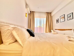 2 dormitorios, tabla de planchar con plancha, wifi y ropa de cama