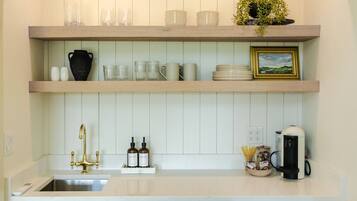 Coffee/tea maker, toaster, dining tables