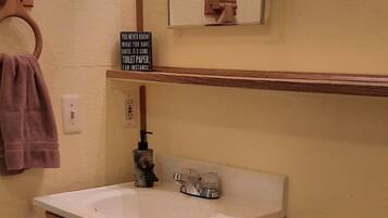 Hair dryer, towels, soap, shampoo