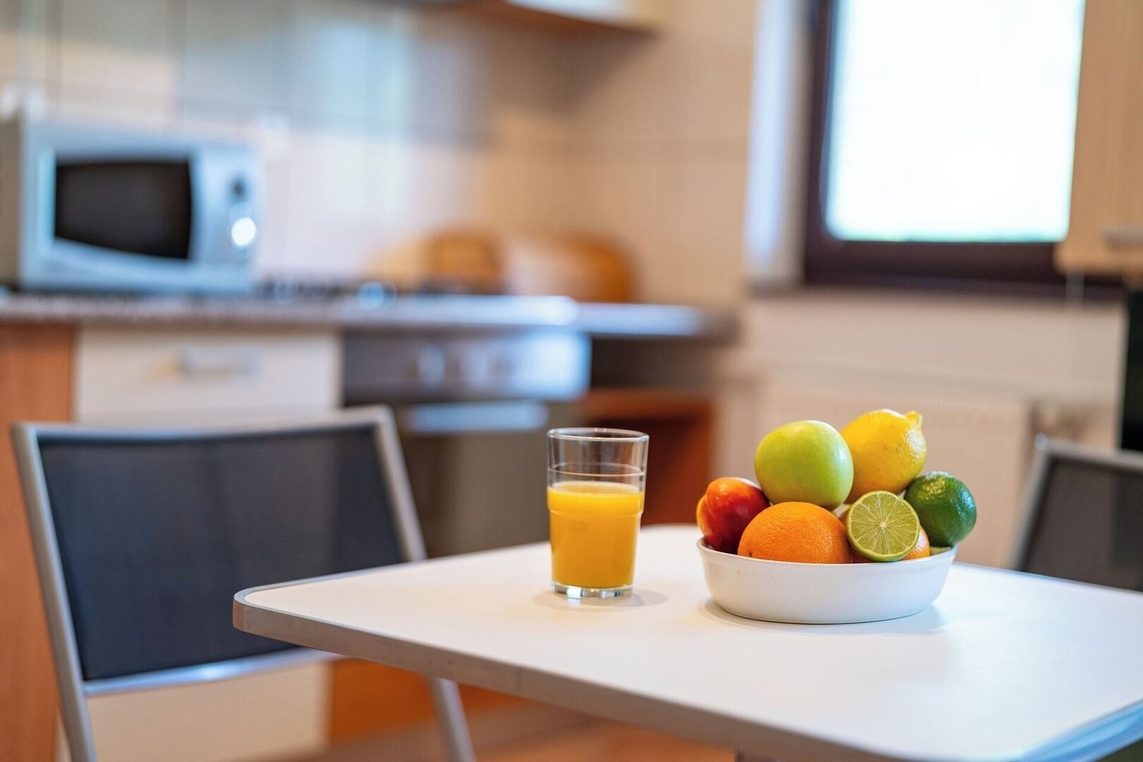 A clean, airy kitchen awaits with natural light and a cheerful vibe — perfect for morning coffee or a healthy breakfast before exploring Sinaia.