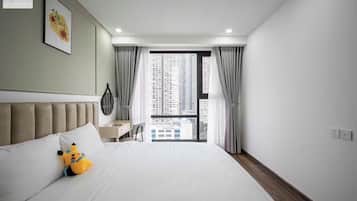 Deluxe Apartment, 4 Bedrooms, Non Smoking, City View | Minibar, iron/ironing board, free WiFi, bed sheets