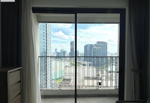 Deluxe Apartment, 1 King Bed, City View | Balcony