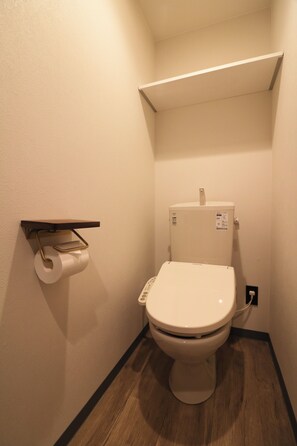 Shower, free toiletries, hair dryer, slippers