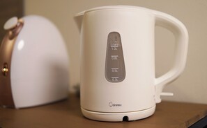 Full-size fridge, microwave, stovetop, toaster