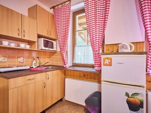 Fridge, microwave, cookware/dishes/utensils