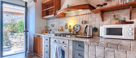 Fridge, microwave, oven, cookware/dishes/utensils