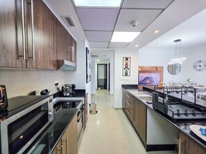 Fridge, stovetop, coffee/tea maker, toaster