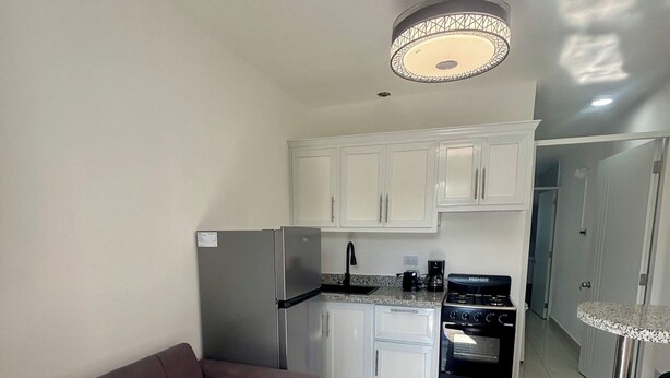 Unclassified image, 1 of 17, button - Room-condo With Pool View in the Center (Sosúa)