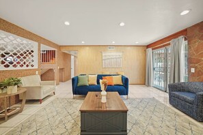 Smart TV, fireplace, books