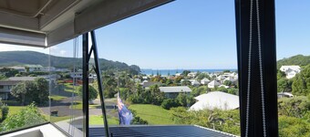 Classic Kiwi Beach Bach – 4 Bedrooms of Laid-Back Charm