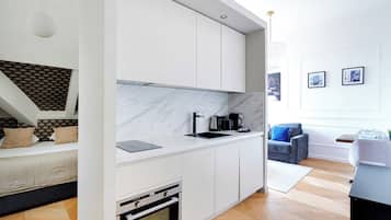 Apartamento | Cozinha privada | Geladeira, fogão, cooktop, lava-louças