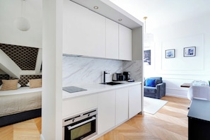 Apartment | Private kitchen | Fridge, oven, stovetop, dishwasher
