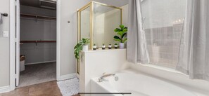 Jetted tub, hair dryer, towels, soap