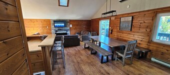 Spacious 6-bedroom Swiss style chalet in with Hot-tub for 14 people .