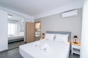 Tabla de planchar con plancha, wifi gratis y ropa de cama 