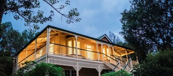 Polished wooden floor Queenslander with big mountain views and U-shaped deck